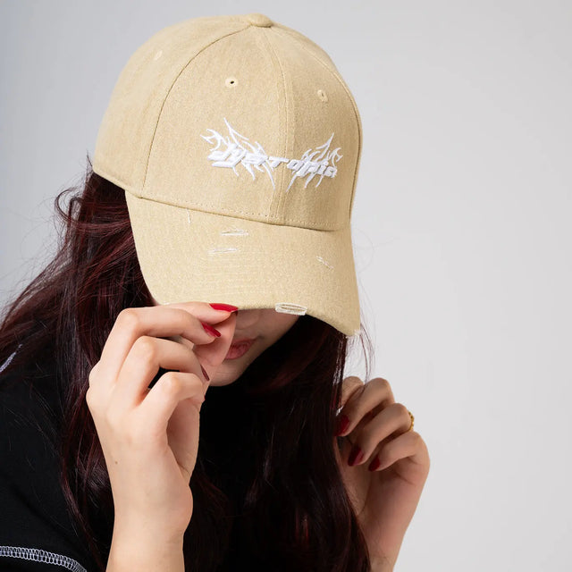 Beige Cap with White Logo Dystopia